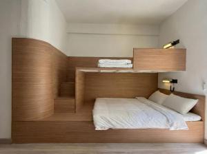 Ένα ή περισσότερα κρεβάτια σε δωμάτιο στο Brown H +14 φωτογραφίες