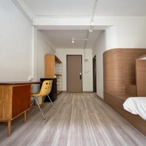 Ένα ή περισσότερα κρεβάτια σε δωμάτιο στο Brown H