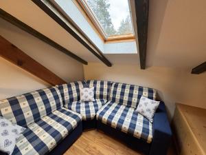 Postel nebo postele na pokoji v ubytování Villetta rifugio tra i larici