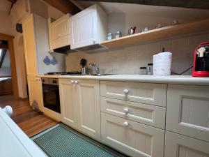 Kuchyň nebo kuchyňský kout v ubytování Villetta rifugio tra i larici + 41 fotografií