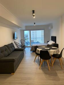 Et opholdsområde på Departamento Senderos Mar y Parque A + 4 billeder