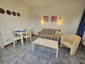 Posezení v ubytování Unterdeck + 8 fotografií