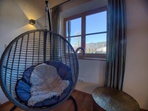 Khu vực ghế ngồi tại Chaletwohnung Weitblick mit Wellnessbereich +31 ảnh