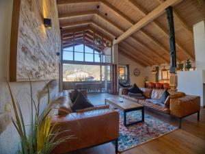 Khu vực ghế ngồi tại Chaletwohnung Weitblick mit Wellnessbereich