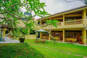 En have udenfor Muthumuni Ayurveda River Resort