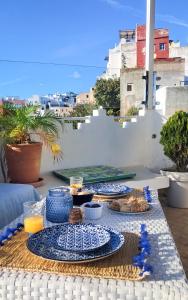 En balkon eller terrasse på Maison Médina, terrasse panoramique, vue mer