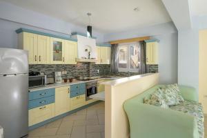 Kuchyň nebo kuchyňský kout v ubytování Doctor'S House by PosarelliVillas