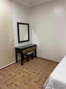 Giường trong phòng chung tại شقق رويال الخبر للشقق المخدومة