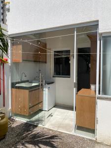 Køkken eller tekøkken på Casa aconchegante 2 quartos