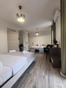 Giường trong phòng chung tại B&B A' Kiazza