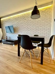 Et tv og/eller underholdning på EASY RENT Apartments- Laurowa 20 24h CHECK IN + 13 billeder