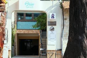 a door to a building with a sign on it at AN Studio VVT in Ho Chi Minh City