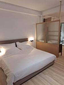 Ένα ή περισσότερα κρεβάτια σε δωμάτιο στο Brown H