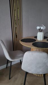 Posezení v ubytování Apartament Lilly & Tilly free parking podziemny + 9 fotografií