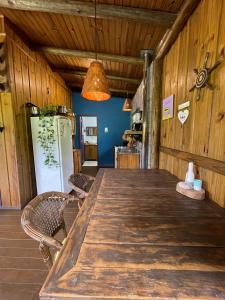 Billede fra billedgalleriet på CASINHA de MADEIRA ACONCHEGANTE i Imbituba