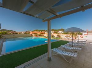 Swimmingpoolen hos eller tæt på Elegant house in Villasimius