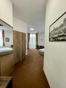 En eller flere senge i et værelse på Resedinta Cina