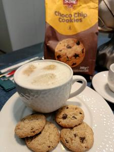 a plate with cookies and a cup of coffee at Telese Charme B&B in Telese +12 photos