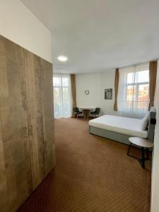 En eller flere senge i et værelse på Resedinta Cina + 50 billeder