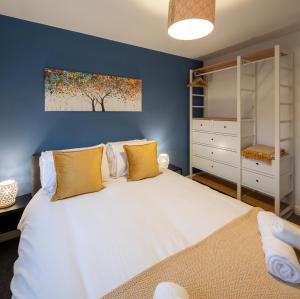 En eller flere senge i et værelse på Park House By Cliftonvalley Apartments