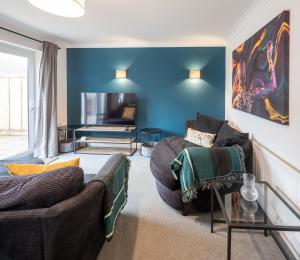 Et tv og/eller underholdning på Park House By Cliftonvalley Apartments