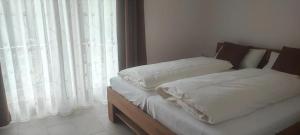 Giường trong phòng chung tại Haus Einhorn