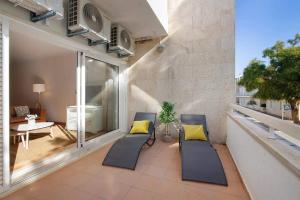 En balkon eller terrasse på 1G Apt Rosmaninho