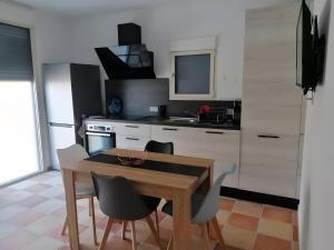 Køkken eller tekøkken på A Casa Assulanata Cinto