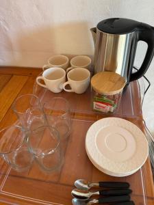 Příslušenství pro přípravu čaje a kávy v ubytování El Cacique Host