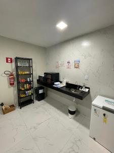 O bucătărie sau chicinetă la Suítes Paraíso Perfeito +21 fotografii