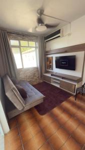 TV a/nebo společenská místnost v ubytování Badaró's Beach