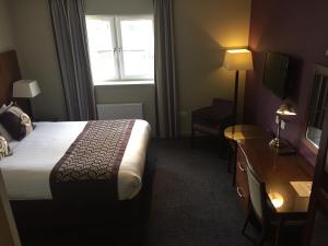 Postel nebo postele na pokoji v ubytování Buchan Hotel