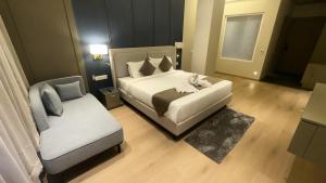 Postel nebo postele na pokoji v ubytování Hotel Saffron