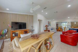 TV a/nebo společenská místnost v ubytování Mango House