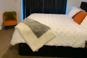 Cama o camas de una habitación en Flat-Sleeps 4 & Direct links to Central London