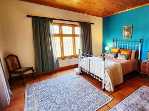 Postel nebo postele na pokoji v ubytování Little Eden Robertson