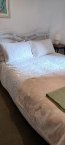 En eller flere senge i et værelse på Fisherman's Cottage, Cromer