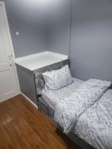 Ένα ή περισσότερα κρεβάτια σε δωμάτιο στο DudleyPalace