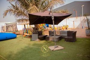 Zahrada ubytování Nyota Lodge Hôtel