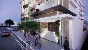 una representación de un edificio en una calle de la ciudad en voco Darwin Suites by IHG, en Darwin