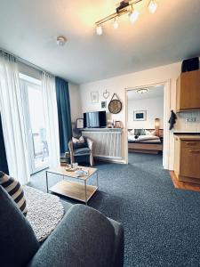 Køkken eller tekøkken på Ferienwohnungen Germania