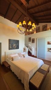 Postel nebo postele na pokoji v ubytování Villa Dei Fiori