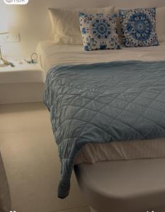 Postel nebo postele na pokoji v ubytování Eidolion Essence