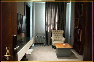 TV a/nebo společenská místnost v ubytování The Capital Heart Hotel + 19 fotografií