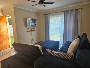 TV a/nebo společenská místnost v ubytování Lovely Beauty Rest