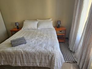 Postel nebo postele na pokoji v ubytování Lovely Beauty Rest