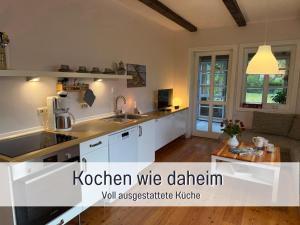 Kuchyň nebo kuchyňský kout v ubytování elbe511ferienzuhause Ruheoase im Grünen