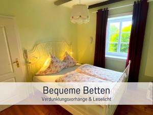 Postel nebo postele na pokoji v ubytování elbe511ferienzuhause Ruheoase im Grünen