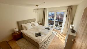 En eller flere senge i et værelse på Haus Monterosa