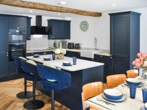 Kuchyň nebo kuchyňský kout v ubytování Faith Cottage